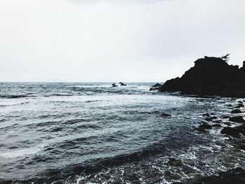 Scenic view of sea and clear sky