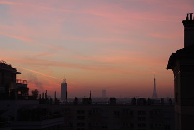Cityscape against sky during sunset
