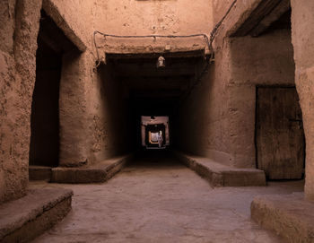 EMPTY CORRIDOR IN BUILDING