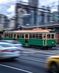 Blurred motion of tram train in city