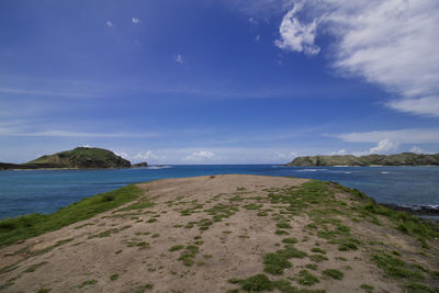 Tanjung ann beach, kuta mandalika, lombok. scenic view of beach against sky