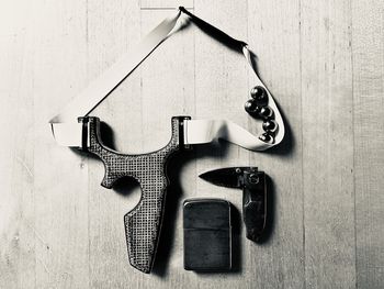 High angle view of objects on table against wall