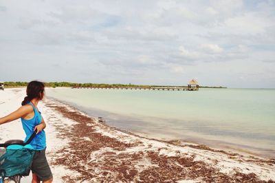 Scenic view of beach against sky