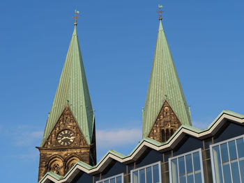 Low angle view of traditional building against clear blue sky