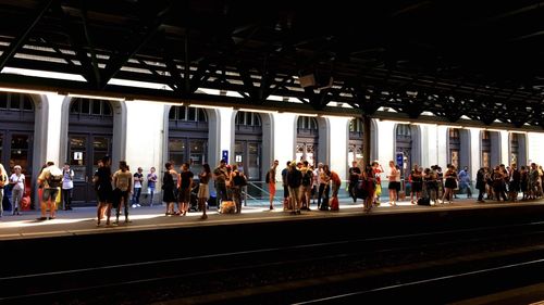 People on railroad station platform