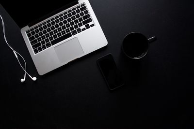 High angle view of computer keyboard on table