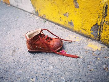 High angle view of damaged leaf on street