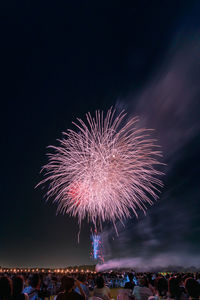 Firework display at night