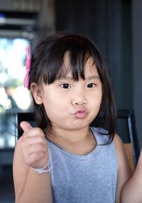 Close-up portrait of cute girl