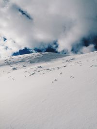Snow covered mountain against sky