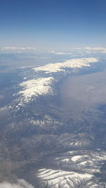 Scenic view of sea against sky during winter