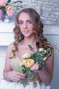 Portrait of a beautiful young woman at home