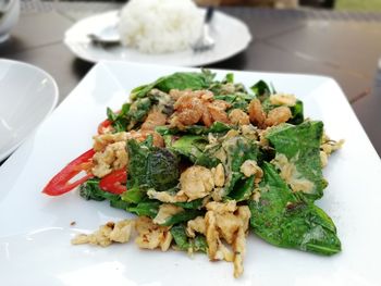 High angle view of salad in plate on table