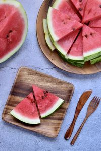 High angle view of fruits on cutting board
