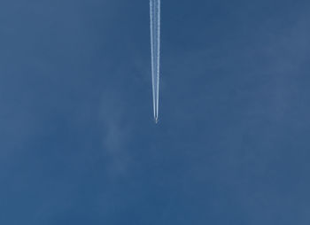 Low angle view of vapor trail in sky