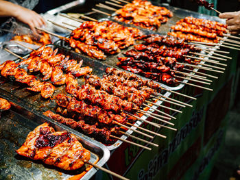 High angle view of meat on barbecue grill