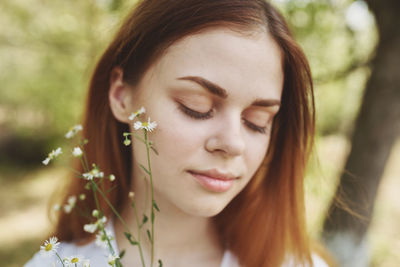 Close-up portrait of young woman