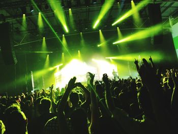 Crowd at music concert during night