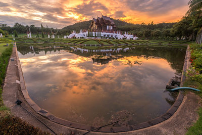 Reflection of clouds in lake during sunset