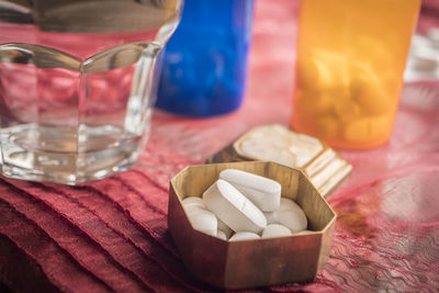 Close-up of drink in glass jar on table