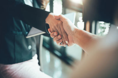 Close-up of woman holding hands