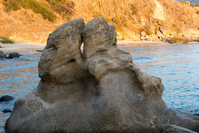 View of rock formation on beach