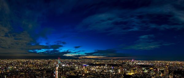 High angle view of illuminated buildings at night