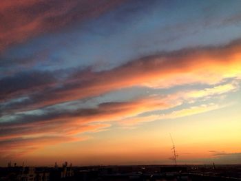 Scenic view of dramatic sky during sunset