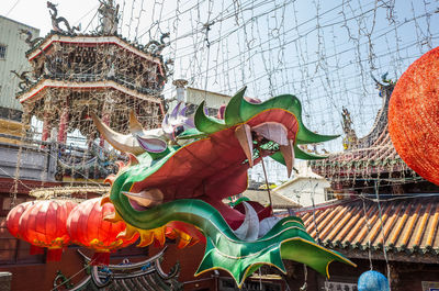 Sculpture of carousel in amusement park