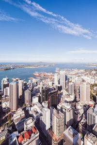 Aerial view of buildings against sky in city
