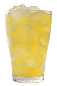 Close-up of beer glass against white background