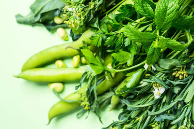 Close-up of vegetables against green background