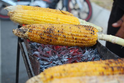 Close-up of yellow meat on barbecue grill