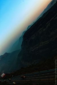 Scenic view of mountains against sky during sunset