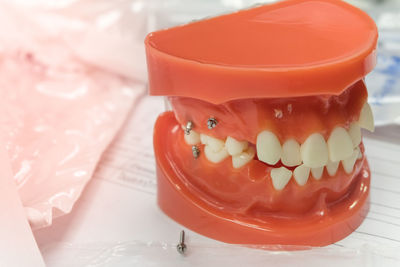 Close-up of dentures on table