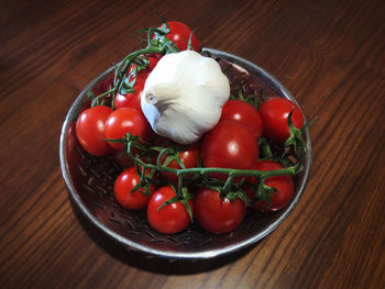 High angle view of cherry tomatoes on table
