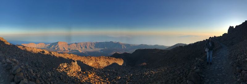 Panoramic view of mountains against sky during sunset