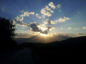 Scenic view of landscape against sky during sunset