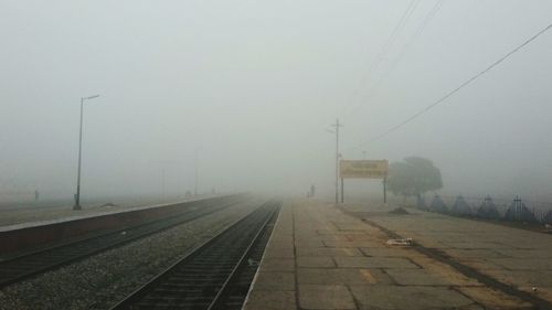 Railroad track in foggy weather