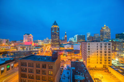 Illuminated buildings in city