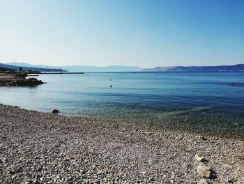 Scenic view of sea against clear sky