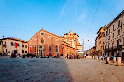 Buildings in city against sky