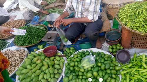 Vendor selling vegetable at market