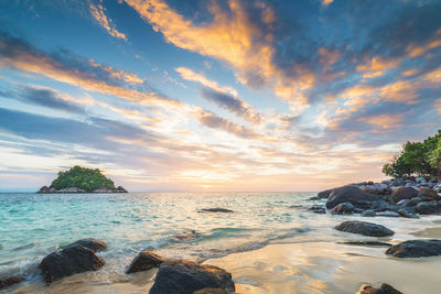 Scenic view of sea against sky during sunset