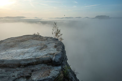 Scenic view of rock against sky