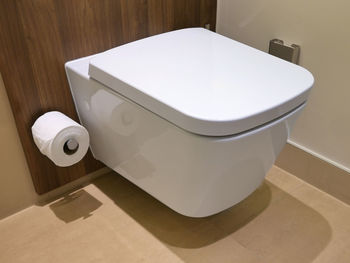 Toilet bowl in bathroom