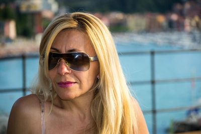 Portrait of young woman in swimming pool