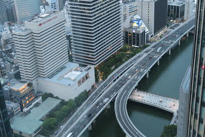 High angle view of street amidst buildings in city