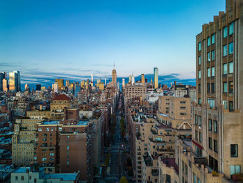 Aerial view long 5th avenue and surrounding town development at twilight. tall downtown skyscrapers
