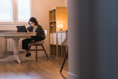 White woman working from home